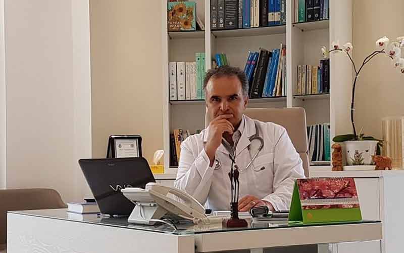 دکتر عباس انتظاری | بهترین دکتر درمان میخچه در تهران